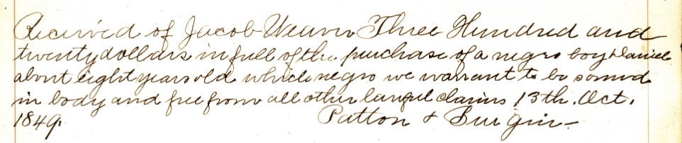 A clipping from a hand written slave deed from 1849, documenting the sale of an eight year old boy named Daniel